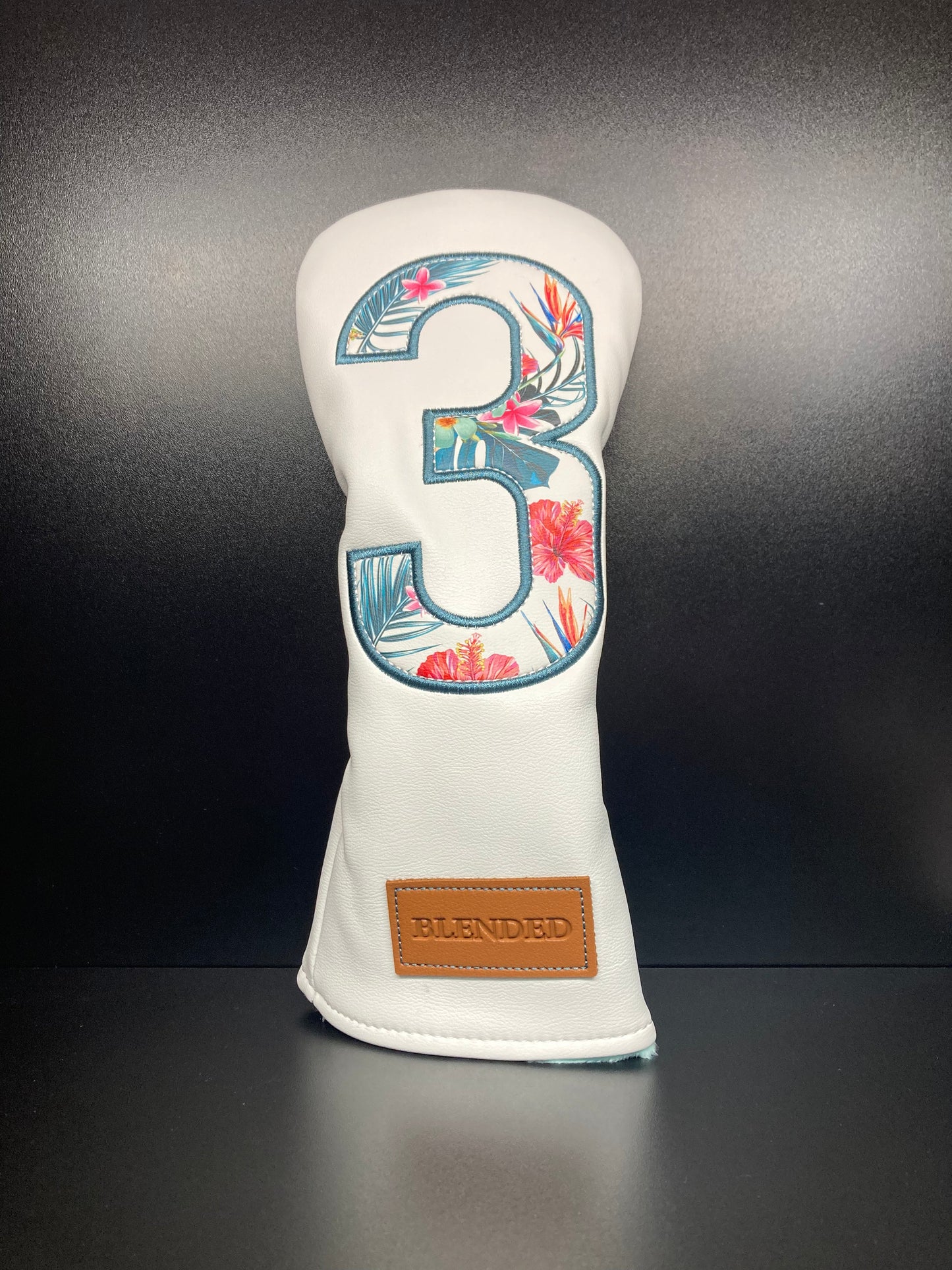 Couvre-club de golf à motif floral tropical vibrant
