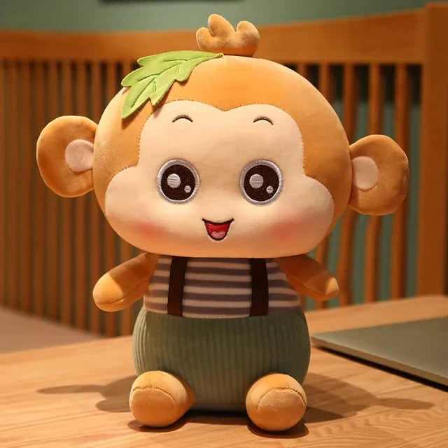 Jouets en peluche singe assis charmants pour tous les âges