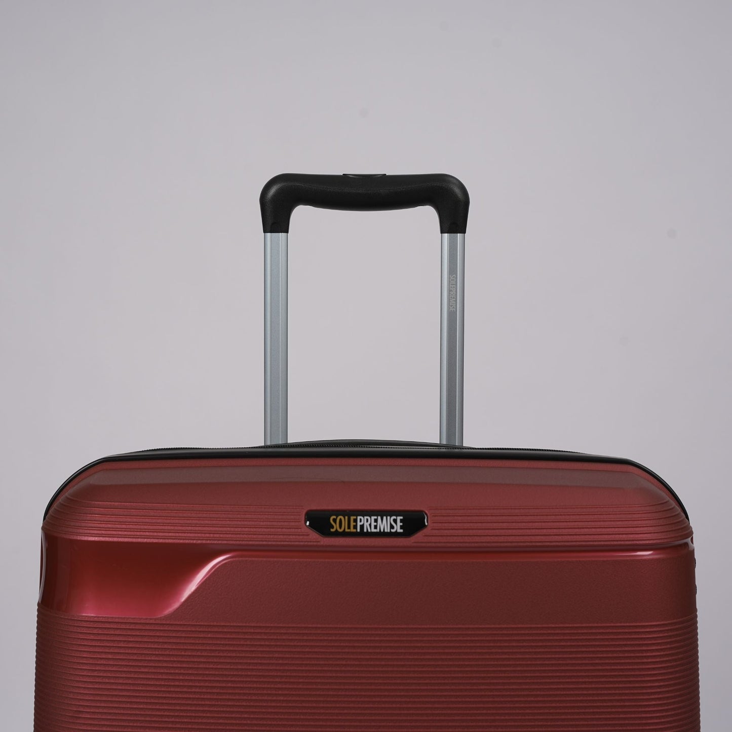 Maleta rígida roja de 28 pulgadas con ruedas de 360° y cerradura TSA