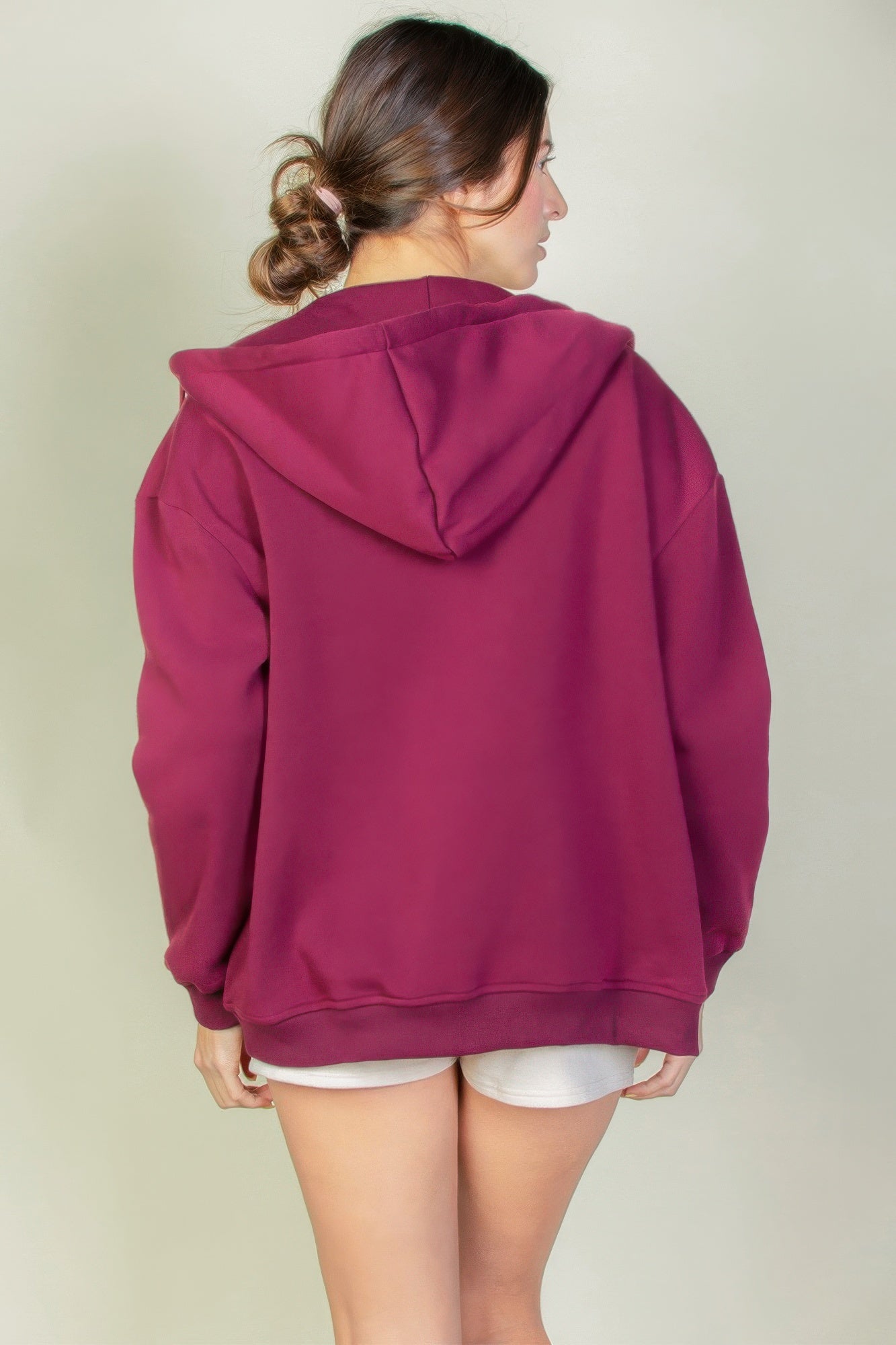 Sudadera con cremallera y hombros caídos gráficos