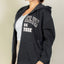 Sudadera con cremallera y hombros caídos gráficos