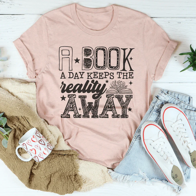 A Book A Day Keeps The Reality Away Tee