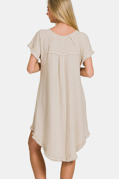 Robe fluide à ourlet asymétrique avec poches