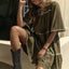 Chic Bohemian Tiered Dress with Tassel Details and Contrast Trim - Korvel