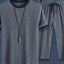 Conjunto de camiseta de cuello redondo de manga corta y pantalones cortos para hombres en tallas gra
