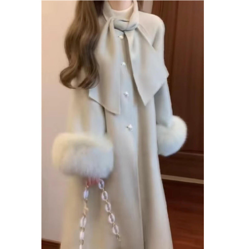 Manteau en laine double face à manches en fourrure pour femmes haut de gamme
