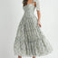 Robe midi froncée à buste floral avec lien d'épaule