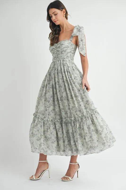 Robe midi froncée à buste floral avec lien d'épaule