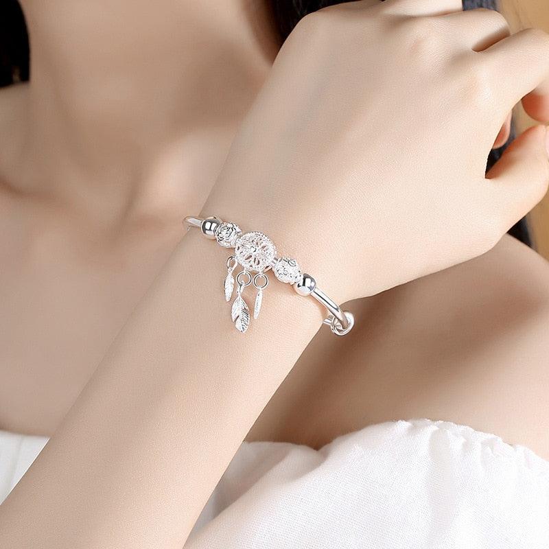 Bracelet en argent sterling réglable avec charme attrape-rêves et plume