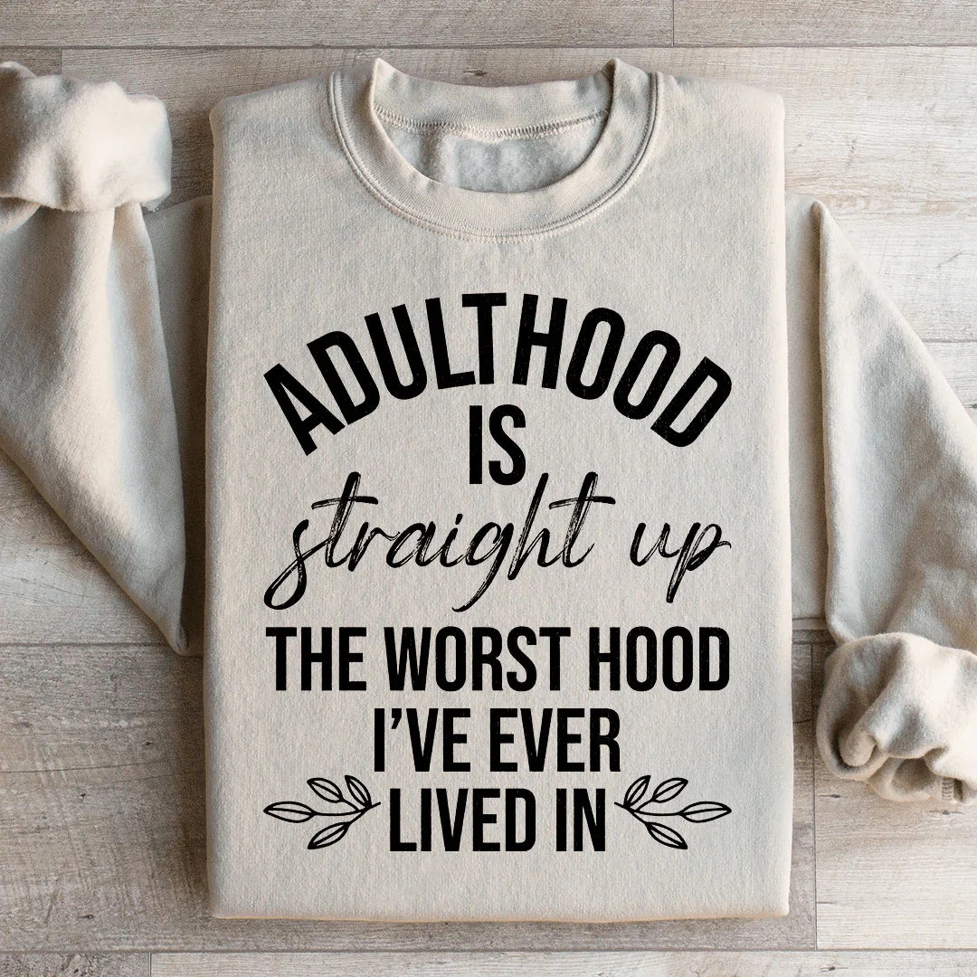 Sudadera "La edad adulta es el peor barrio en el que he vivido"