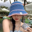 Chapeau seau en paille tissée assorti pour femmes