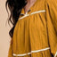 Vestido de media manga con cuello atado y dobladillo de contraste con borlas