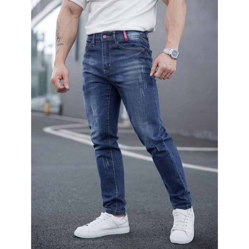 Men's Ripped Denim Jeans with Cat-Whisker Scratches