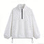 Chaqueta con capucha de media cremallera y lunares a la moda