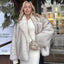 Manteau mi-long en fausse fourrure de renard pour femmes avec col style blazer