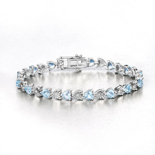 Elegant Blue Topaz and Diamond Sterling Silver Bracelet