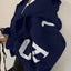 Sudadera con cremallera de manga larga y corte relajado para mujer