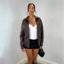 Chaqueta Bomber de Cuero Sofisticada con Cuello de Solapa