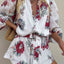 Mono de manga larga con estampado floral