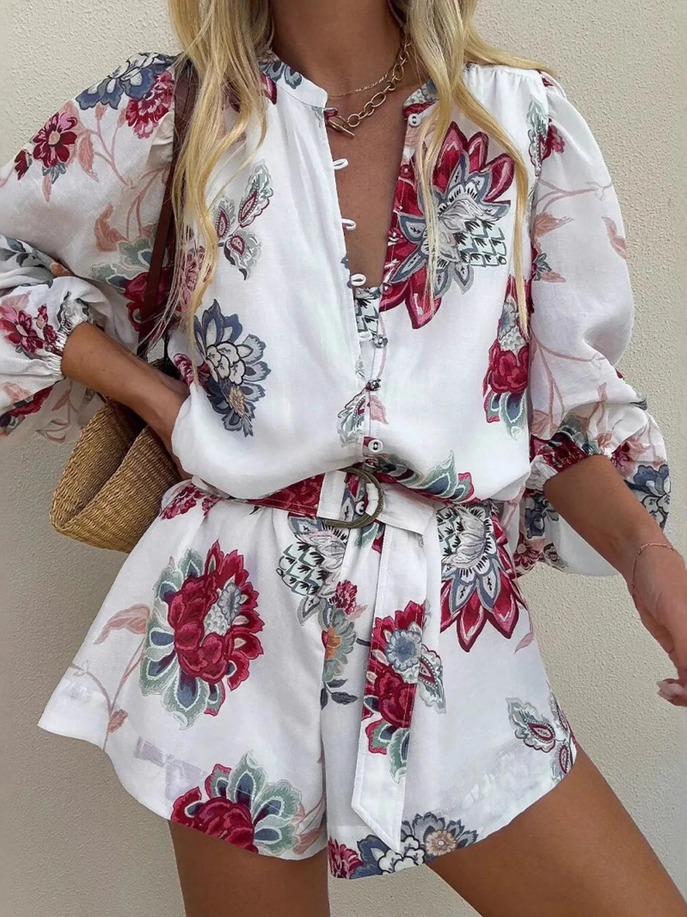 Mono de manga larga con estampado floral