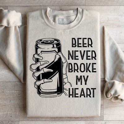 Sudadera con capucha y calavera "La cerveza nunca me rompió el corazón"
