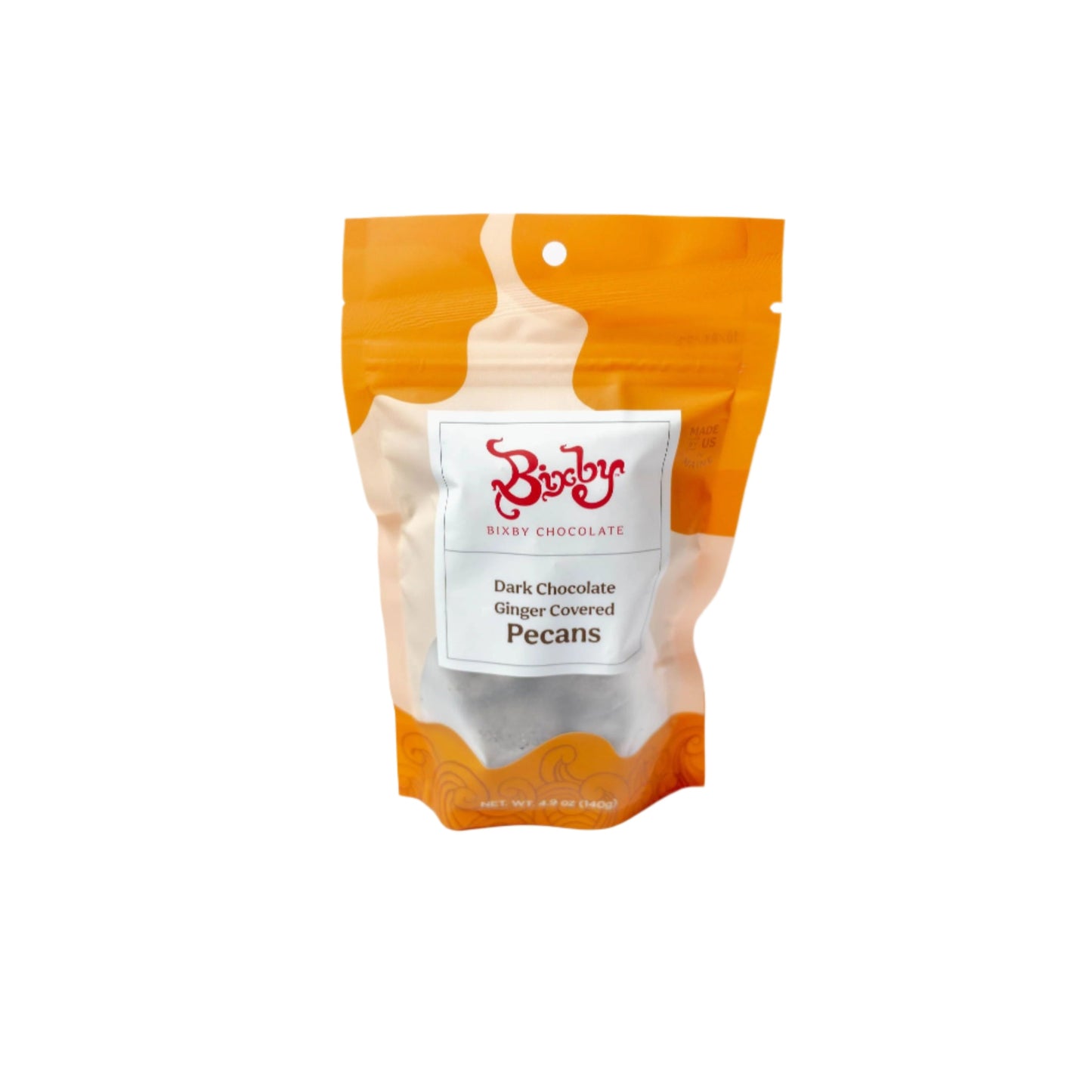 Nueces pecanas cubiertas con jengibre y chocolate negro