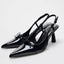 Sandales élégantes en cuir verni noir pour femmes avec nœud