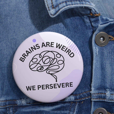 Los cerebros son raros. Perseveramos. Botón de pin