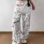 Pantalons de survêtement à jambe large imprimé abstrait