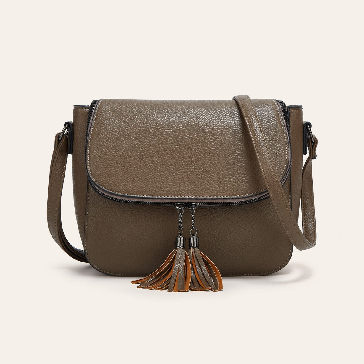 Fashionable Flip-Top Saddle Bag with Tassels