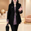 Manteau noir élégant ajusté pour un style quotidien