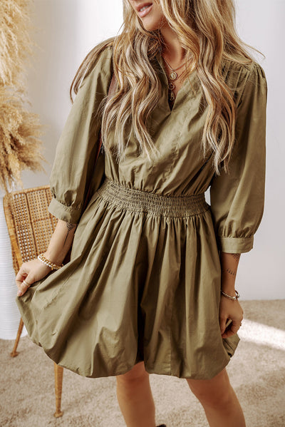 Elegant Green Sleeve Mini Dress with Timeless Smocked Design