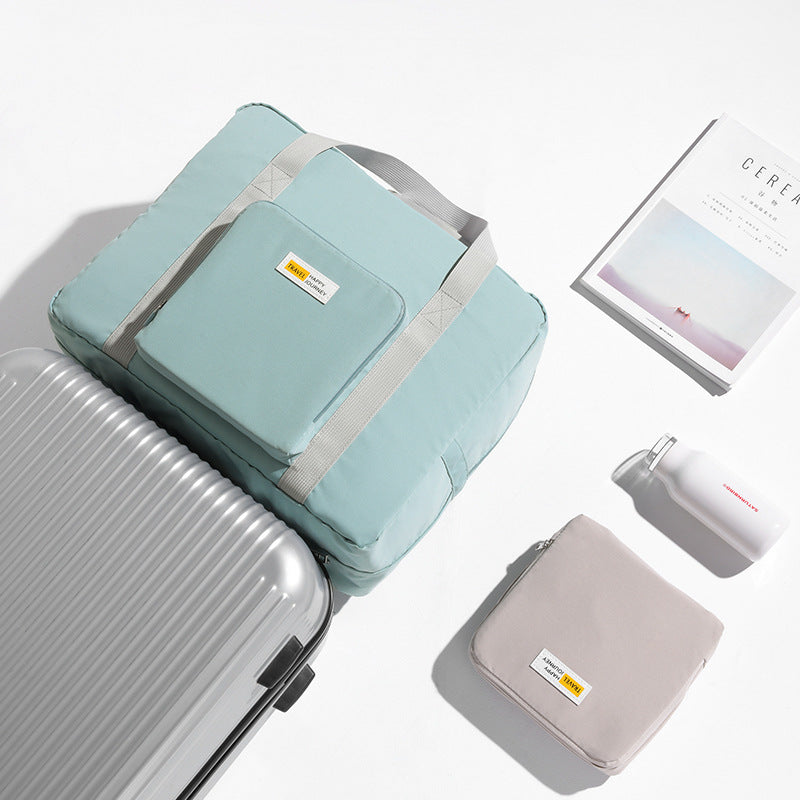 Sac de rangement pour vêtements de voyage pliable