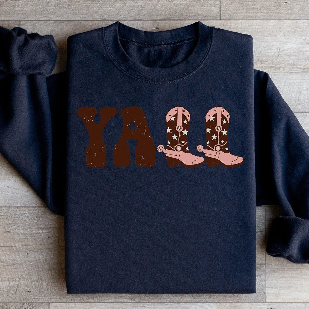 Sudadera con botas de vaquero