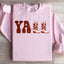 Sudadera con botas de vaquero