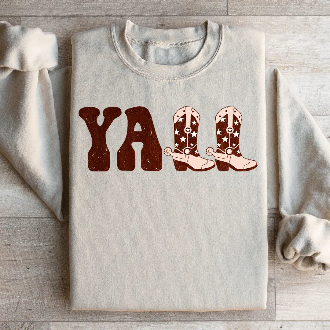 Sudadera con botas de vaquero