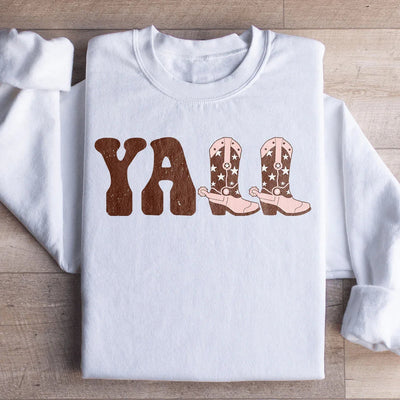 Sudadera con botas de vaquero