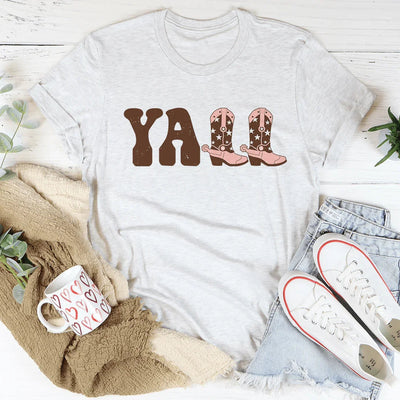 Camiseta con botas de vaquero