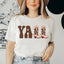 Camiseta con botas de vaquero