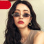 Gafas de sol redondas negras de inspiración vintage para mujeres