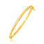 Bracelet pour enfants en or jaune 14 carats avec motif en spirale