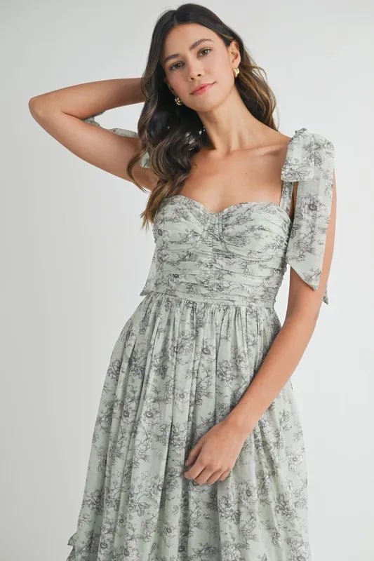 Robe midi froncée à buste floral avec lien d'épaule