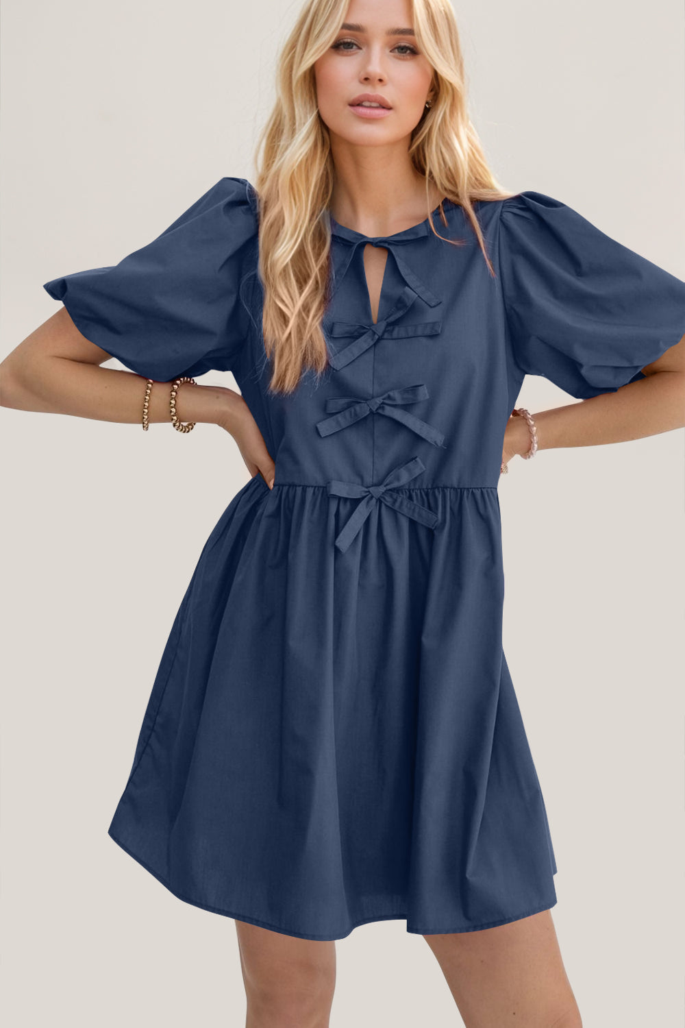 Elegant Ruched Puff Sleeve Mini Dress with Bow Detail
