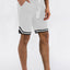 Shorts actifs de basketball rayés pour hommes