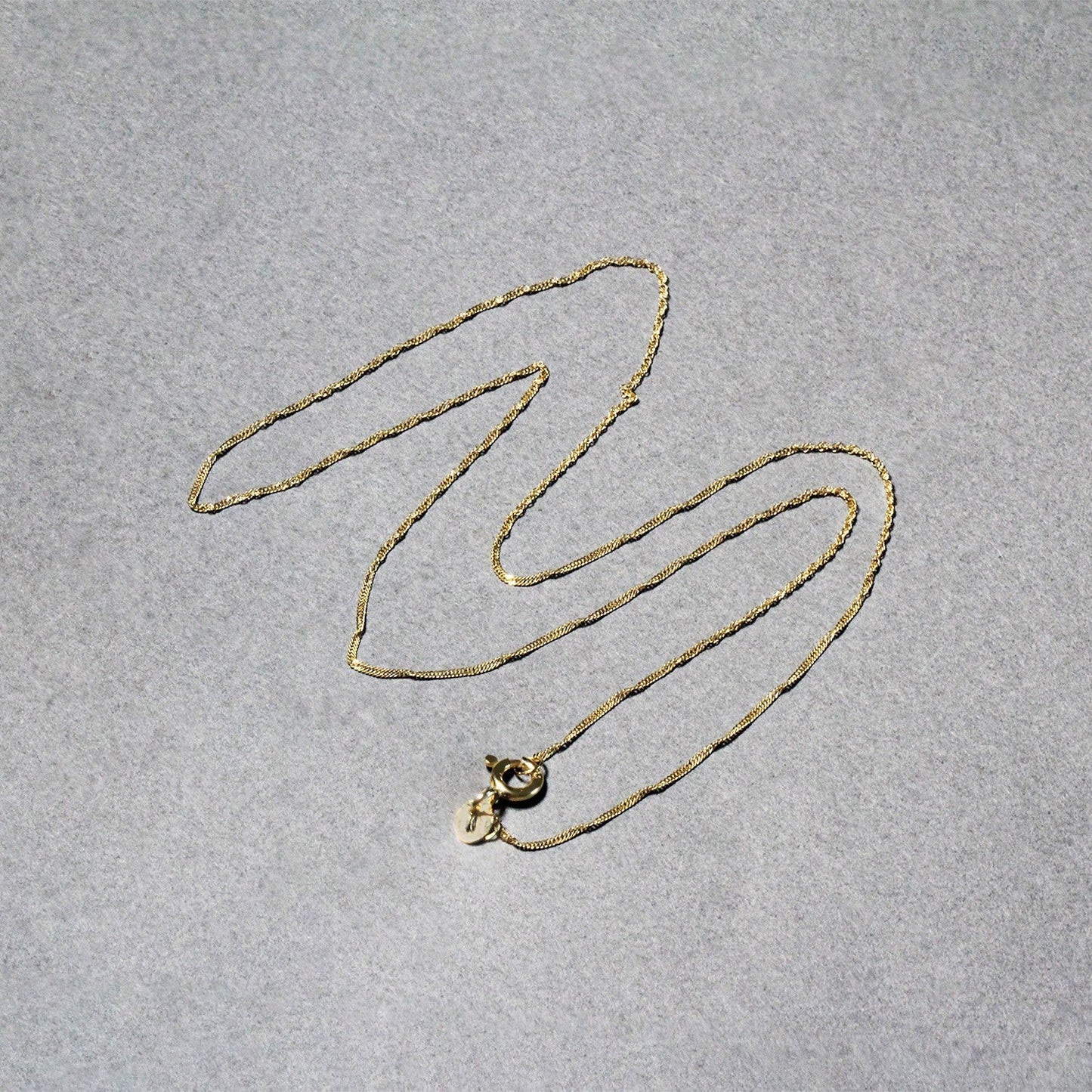 Chaîne Singapore en Or Jaune 14k - 0,8 mm