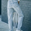 Distressed Asymmetric Waist Jeans - Korvel