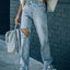 Distressed Asymmetric Waist Jeans - Korvel