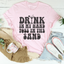 Camiseta "Bebe en mi mano, dedos de los pies en la arena"