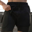 Shorts actifs pour hommes avec cordon de serrage et doublure de compression