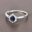 Bague Halo en Saphir Bleu et Diamants de 0,44 Carat en Or Blanc 14K